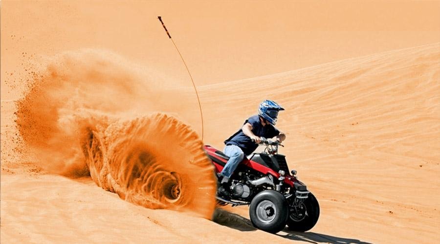 Quad Biking Rider in Dubai Desert